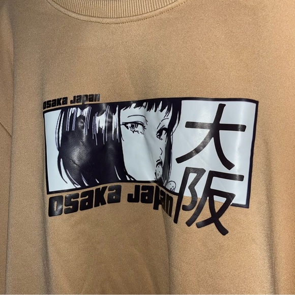 Brown long-sleeved sweater with an anime design - Picture 2 of 2